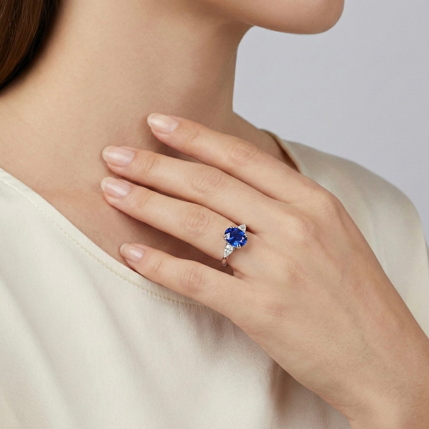 Oval Lab-Grown Sapphire Three-Stone Ring with Pear-Shape Lab-Grown Diamonds in 14 White Gold