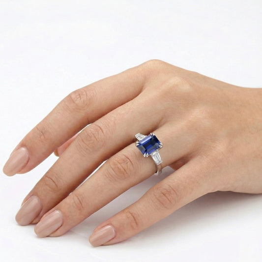 Emerald-Cut Lab-Grown Sapphire Three-Stone Ring with Tapered Baguette Lab-Grown Diamonds in 14k White Gold