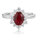 Oval Lab-Grown Ruby and Lab-Grown Diamond Starburst Halo Ring in 14k White Gold