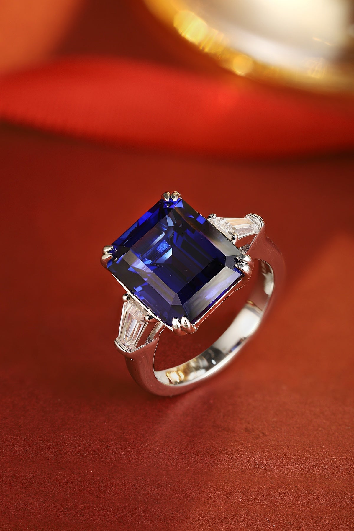 Emerald-Cut Lab-Grown Sapphire Three-Stone Ring with Tapered Baguette Lab-Grown Diamonds in 14k White Gold