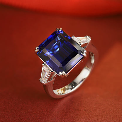 Emerald-Cut Lab-Grown Sapphire Three-Stone Ring with Tapered Baguette Lab-Grown Diamonds in 14k White Gold