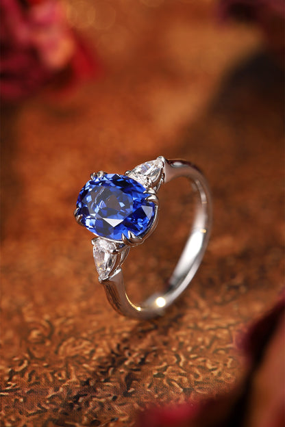 Oval Lab-Grown Sapphire Three-Stone Ring with Pear-Shape Lab-Grown Diamonds in 14 White Gold