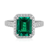 Oval Lab-Grown Emerald Halo Ring with Pavé Band in 14 White Gold